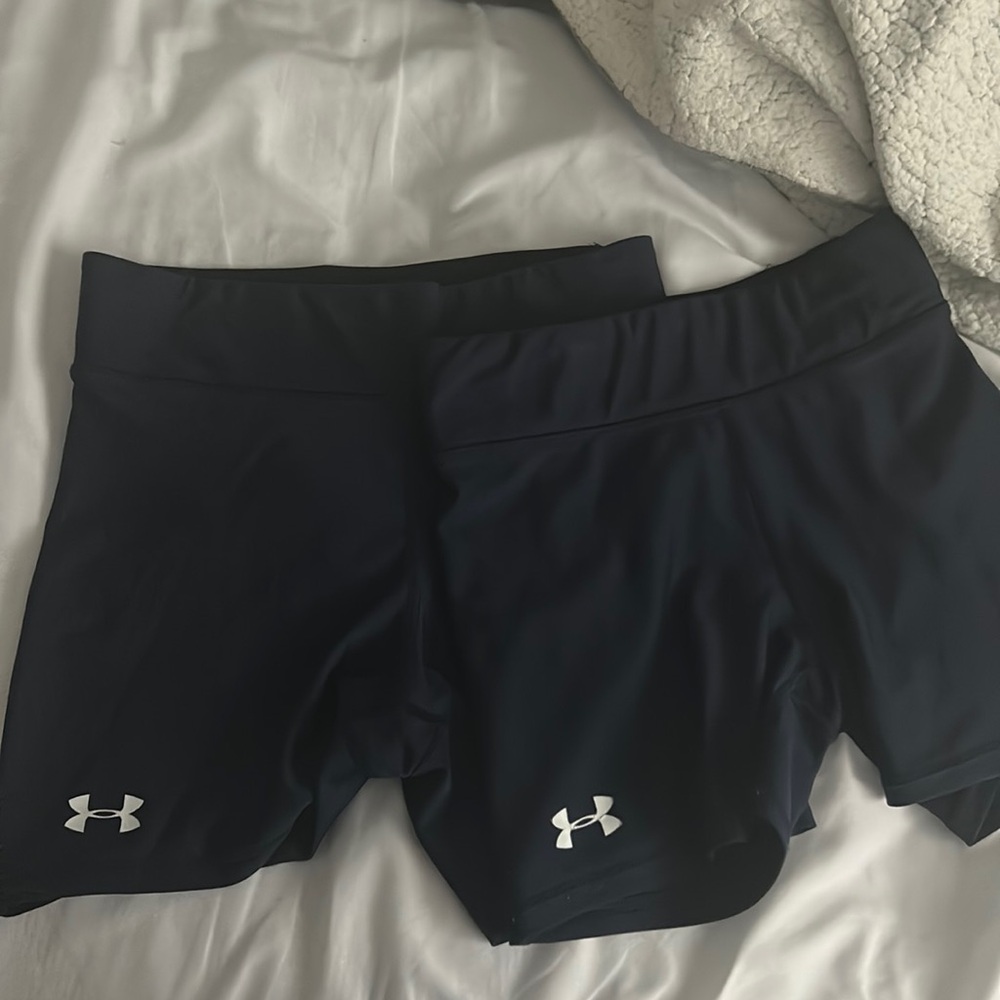 two pairs of under armor booty shorts